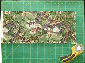 cutting one end of strip with ruler